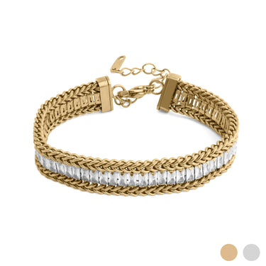 Gold bracelet with clear stones on a white background