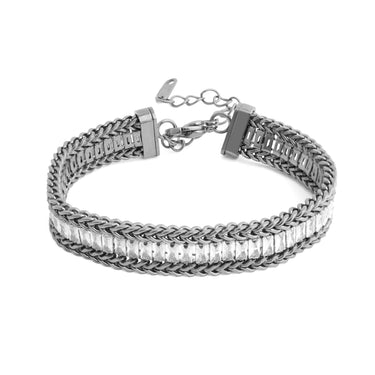 Silver bracelet with clear stones on a white background