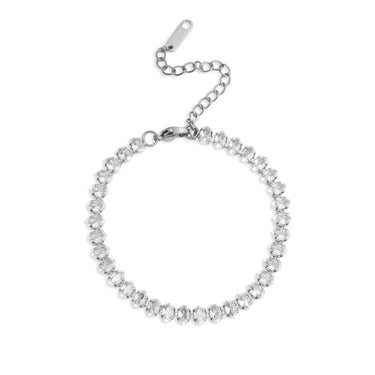 Silver bracelet with clear stones on a white background