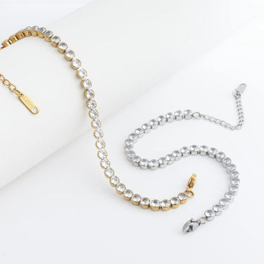 Gold and silver beaded necklace on a white background
