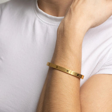 Gold Fluted Floral Bangle on model