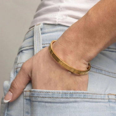 Gold Fluted Floral Bangle on model