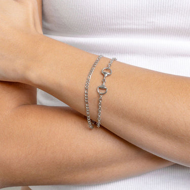 Silver Horsebit Bracelet with a lobster clasp on a person's wrist against a white background
