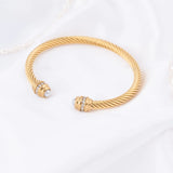 Wholesale jewelry 18K Gold PVD Stainless Steel Pearl Twisted Bangle Bracelet- gold studio 