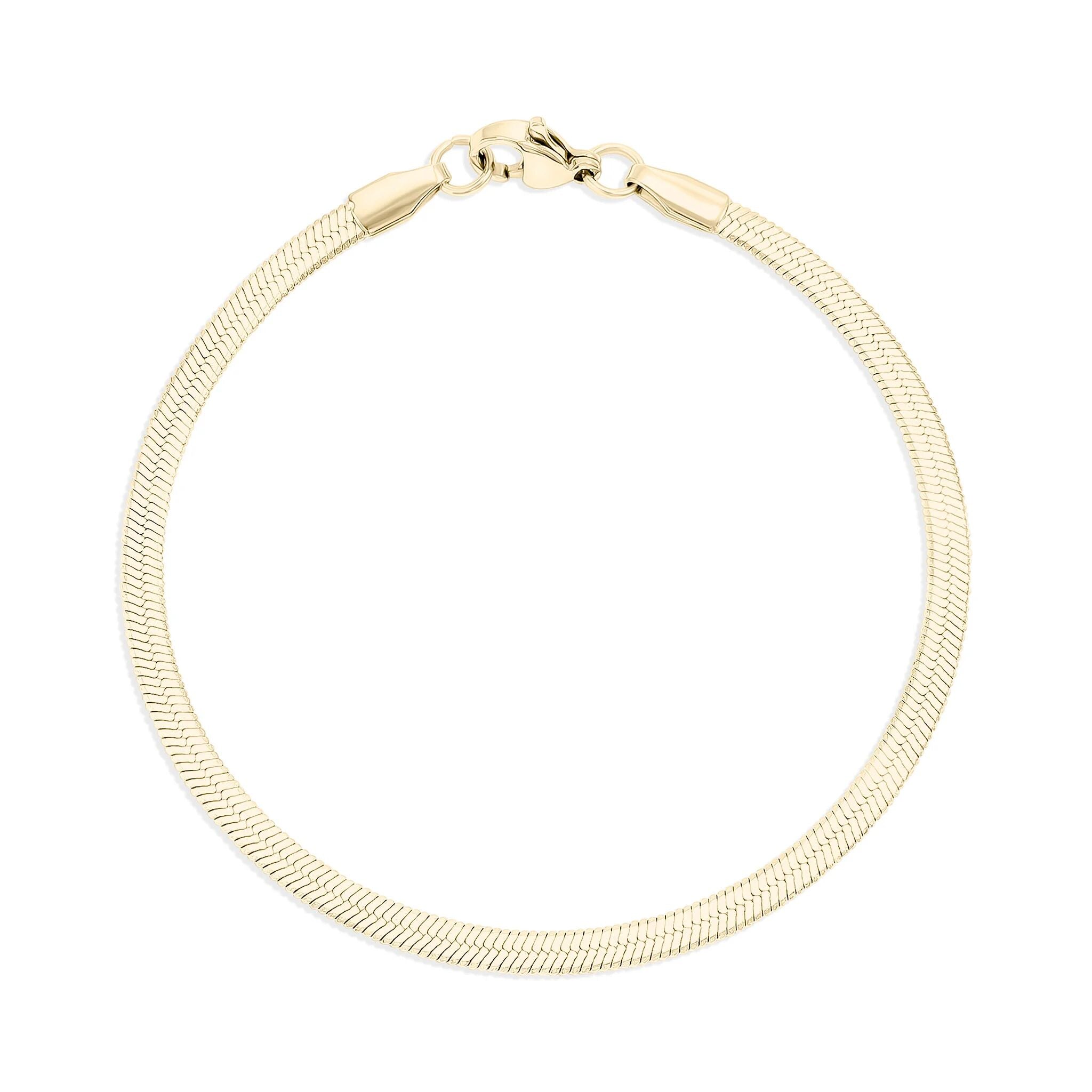 Gold bracelet on a white background