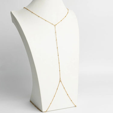 Gold Full Body Chain Satellite on a white mannequin bust against a white background