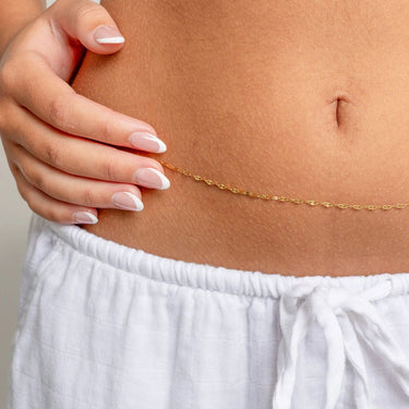 Gold chain Lip Belly Chain with a neutral background