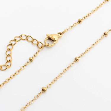 Gold Satellite Belly Chain on a white background