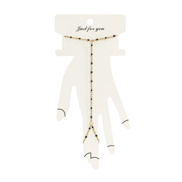 Gold - Black Beaded Hand Chain on Packaging