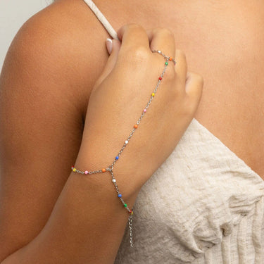 Silver Multi Color Hand Chain worn by a person with a neutral background