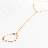 Gold  Lip Hand Chain on a white background
