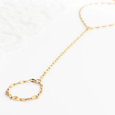 Gold  Lip Hand Chain on a white background