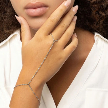 Silver Singapore Hand Chain on a wrist with a neutral background