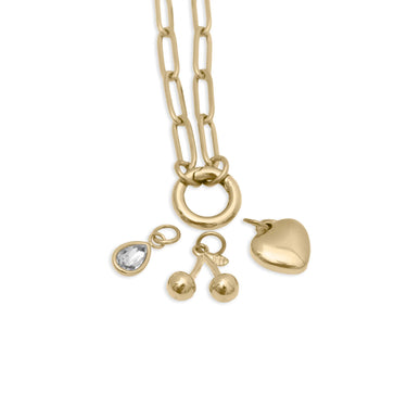 Gold necklace with various pendants on a white background