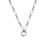 Silver chain necklace with a round pendant on a white background