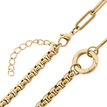 Gold chain necklace on a white background