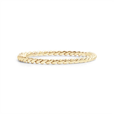 Gold ring with a rope design on a white background