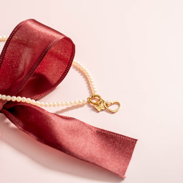 Pearl Charm Keeper