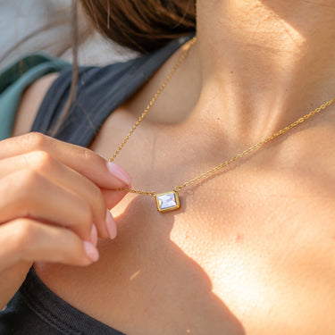 Emerald Charm Connector on a chain