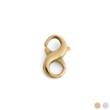 Gold infinity symbol charm on a white background