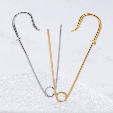 Gold and Silver Charm Brooches