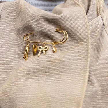 Gold Charm Brooch 