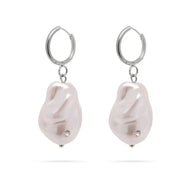 Pair of pearl earrings with silver hoops on a white background