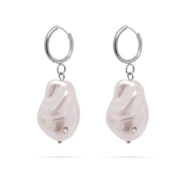 Pair of pearl earrings with silver hoops on a white background