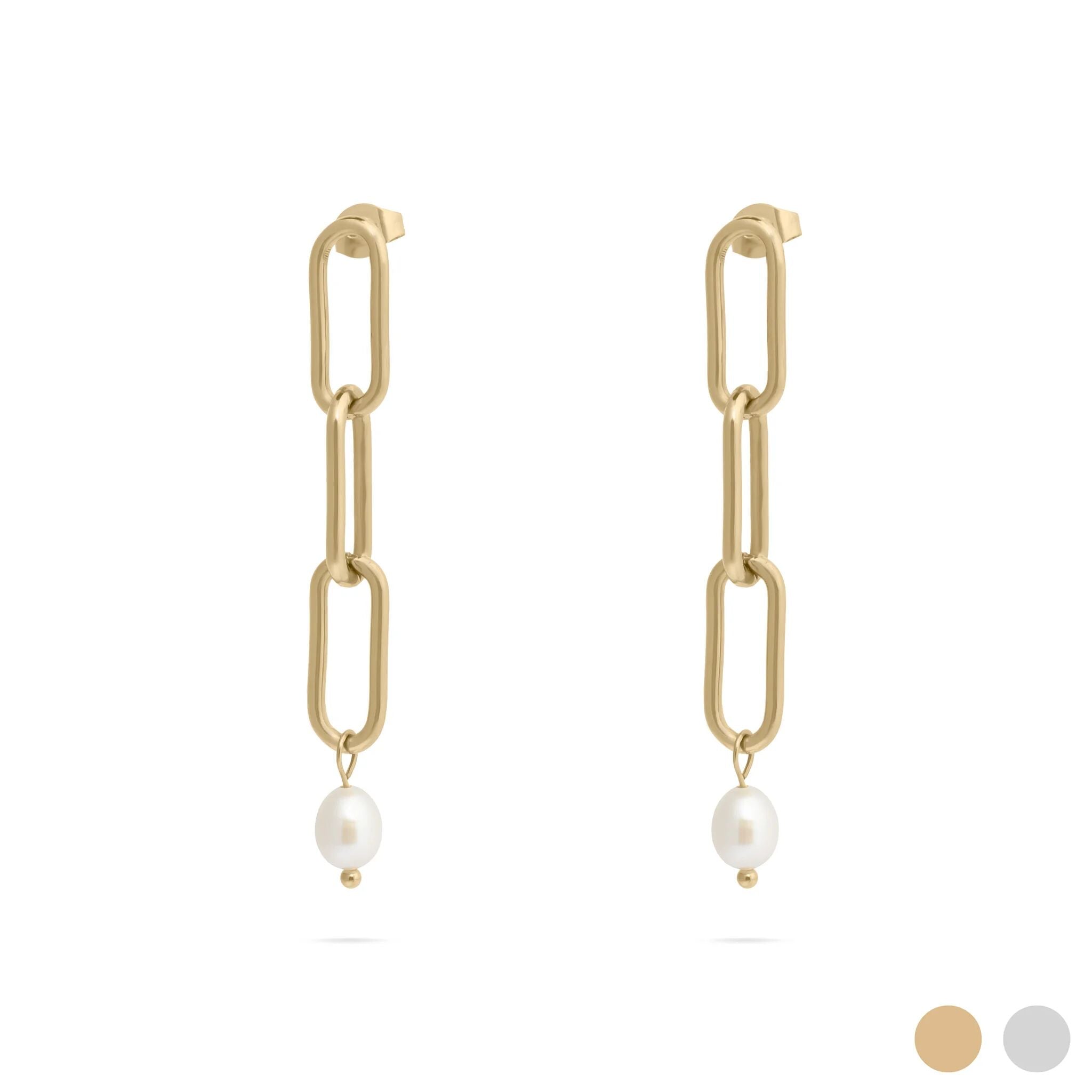 Gold chain earrings with pearl drops on a white background