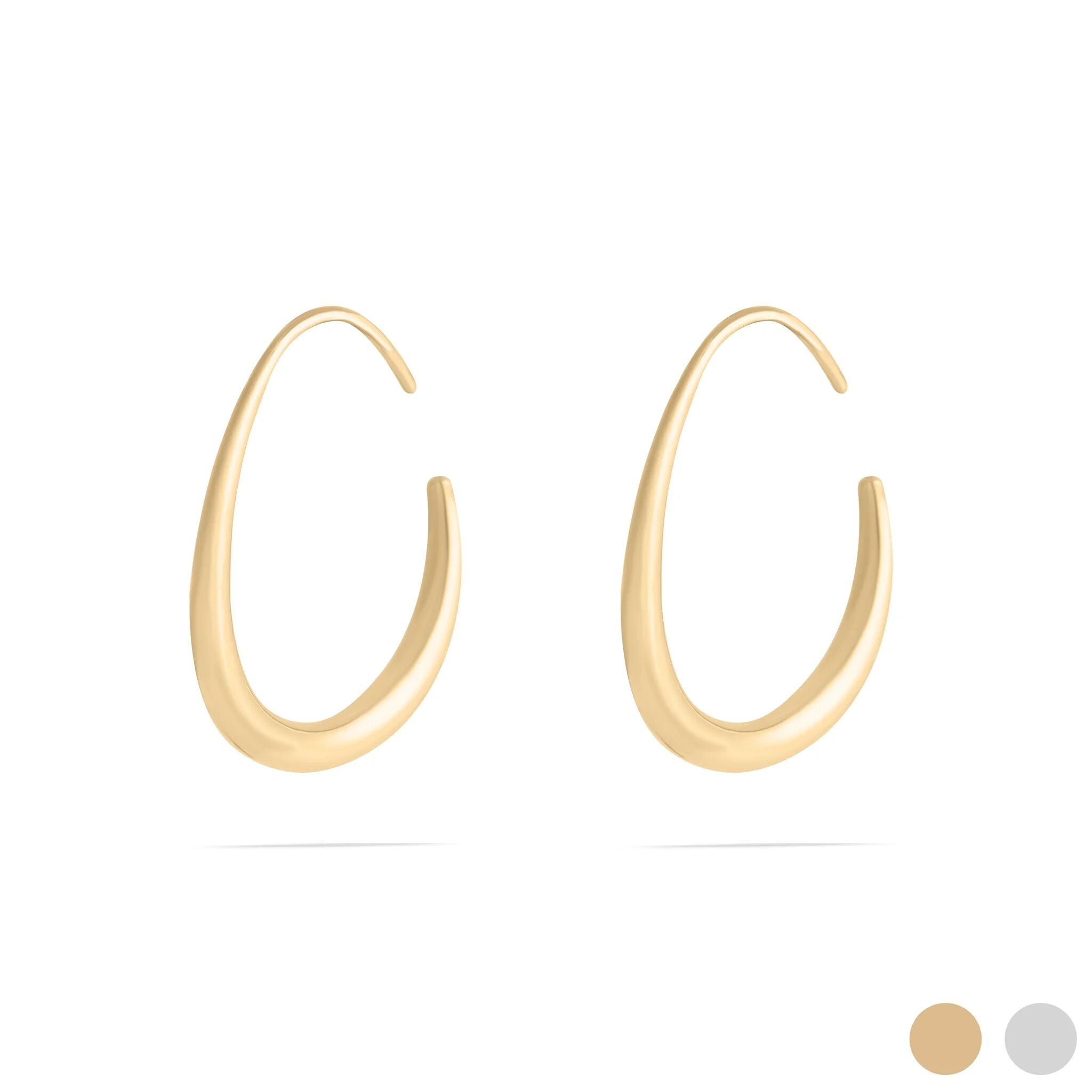 Gold hoop earrings on a white background