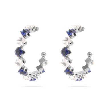 Pair of silver hoop earrings with blue gemstones on a white background