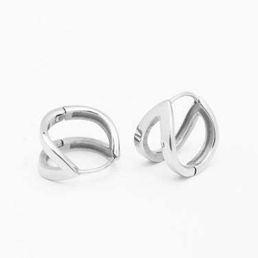Two silver hoop earrings on a white background