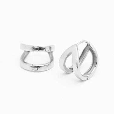 Pair of silver hoop earrings on a white background