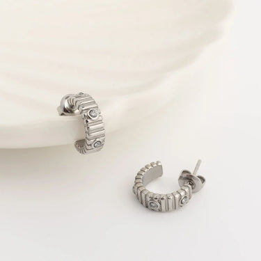 Silver hoop Fluted Huggie with Stones Earrings on a white background