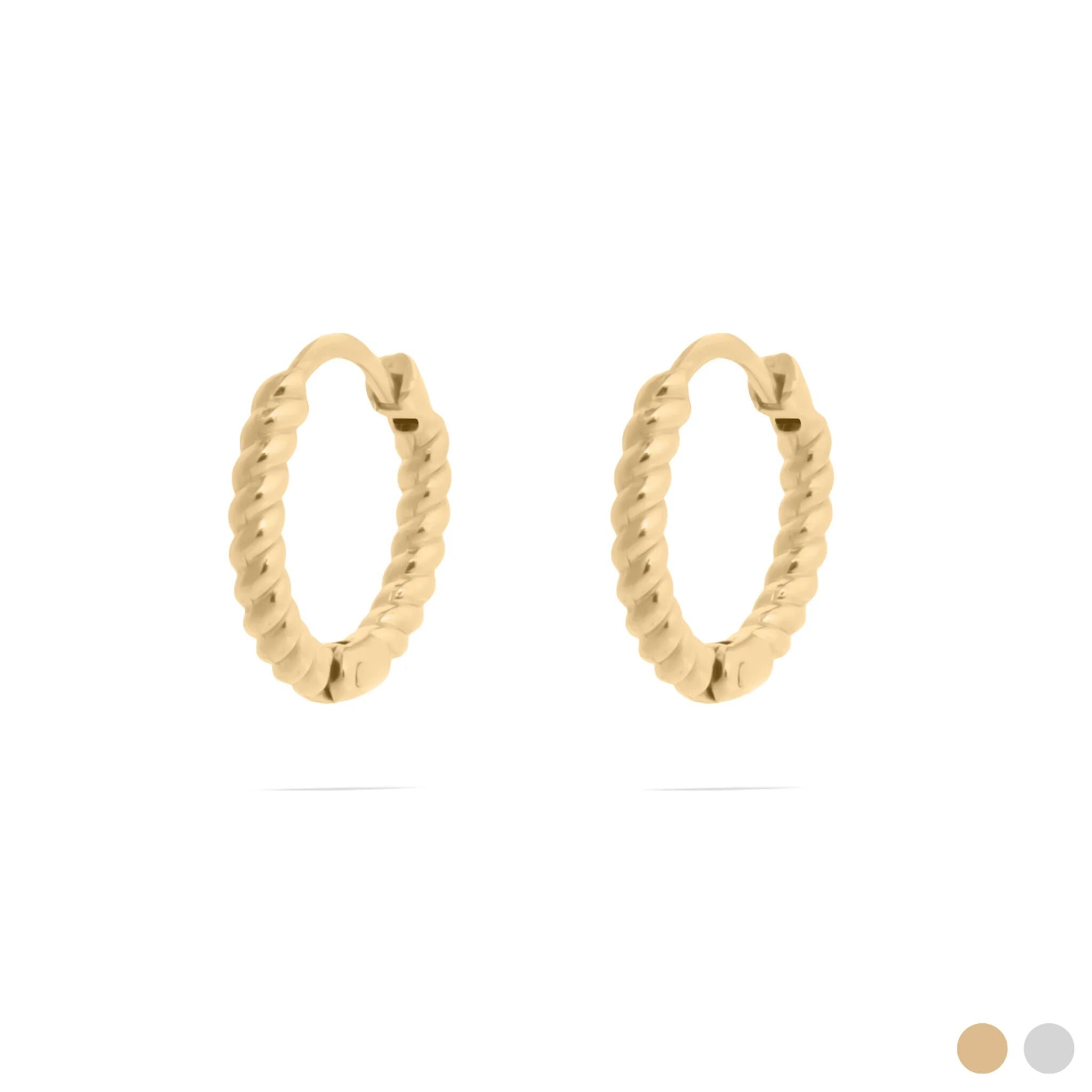 Gold hoop earrings on a white background