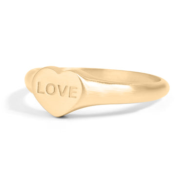 Heart shape signet ring with "love" engraved in the center of the heart side view