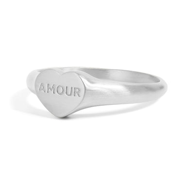 Heart shape signet ring with "amour" engraved in the center of the heart side view