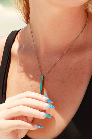 Chain necklace with vertical bar pendant lifestyle photo