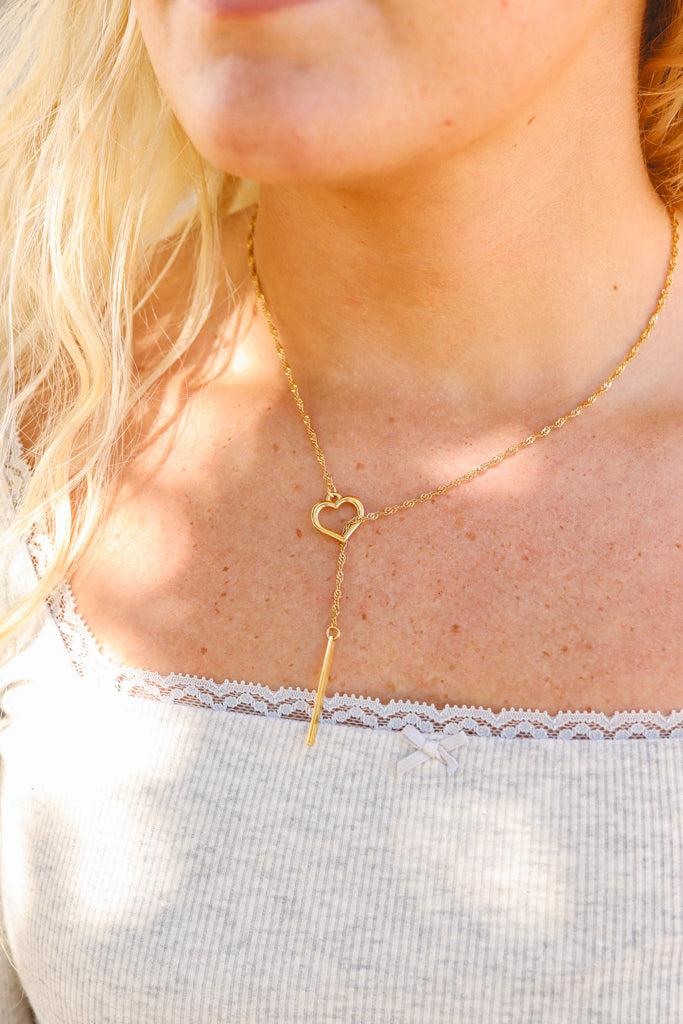 Gold Lariat necklace with drop bar lifestyle