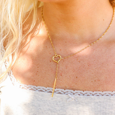 Gold Lariat necklace with drop bar lifestyle