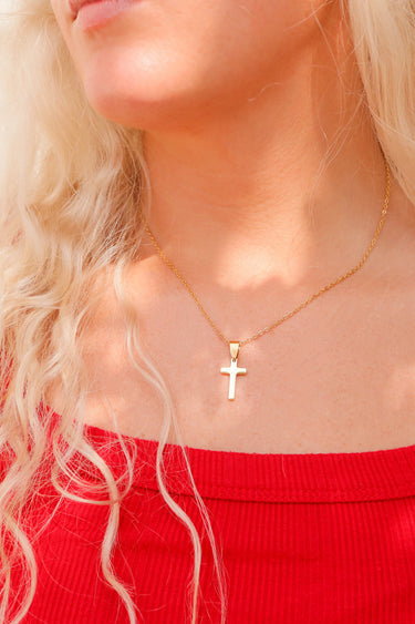 Chain necklace with Christian cross hanging pendant Lifestyle