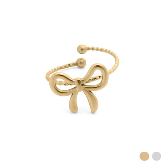 Gold bow-shaped ring on a white background