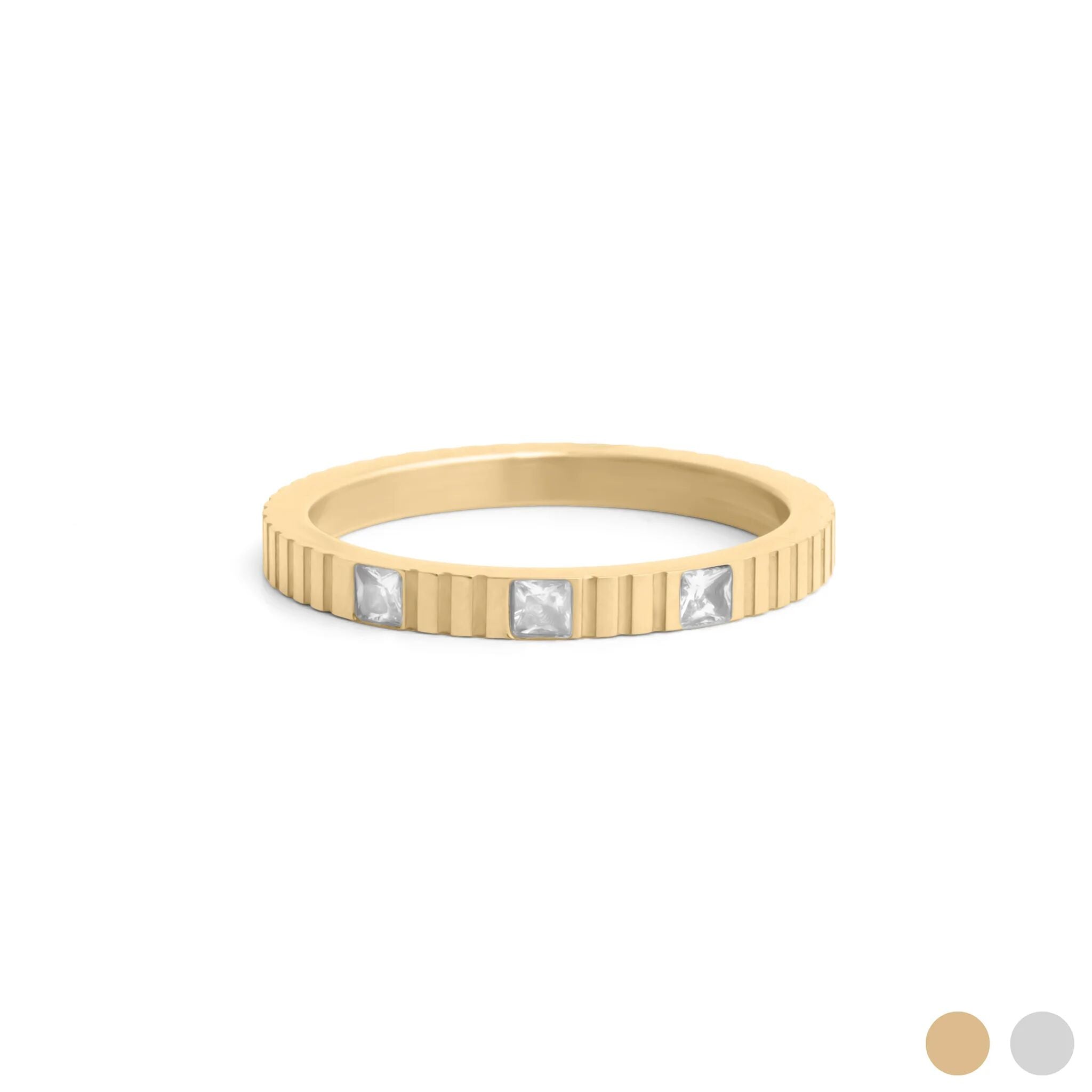 Gold ring with embedded diamonds on a white background