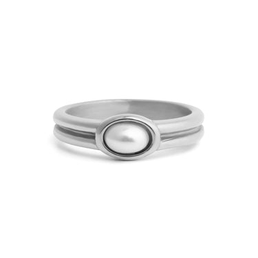 Silver ring with a central pearl on a white background