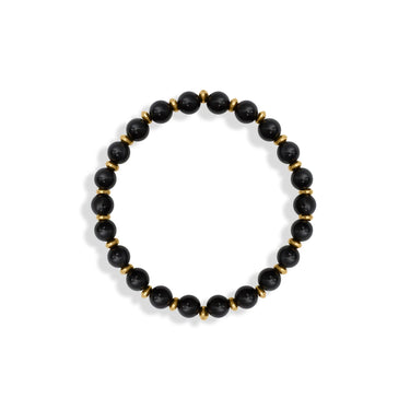 Black beaded bracelet with gold accents on a white background