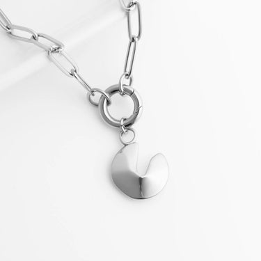 Silver necklace with a Fortune Cookie Charm on a white background