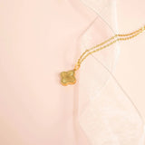 Sunburst Gold Clover Charm on chain