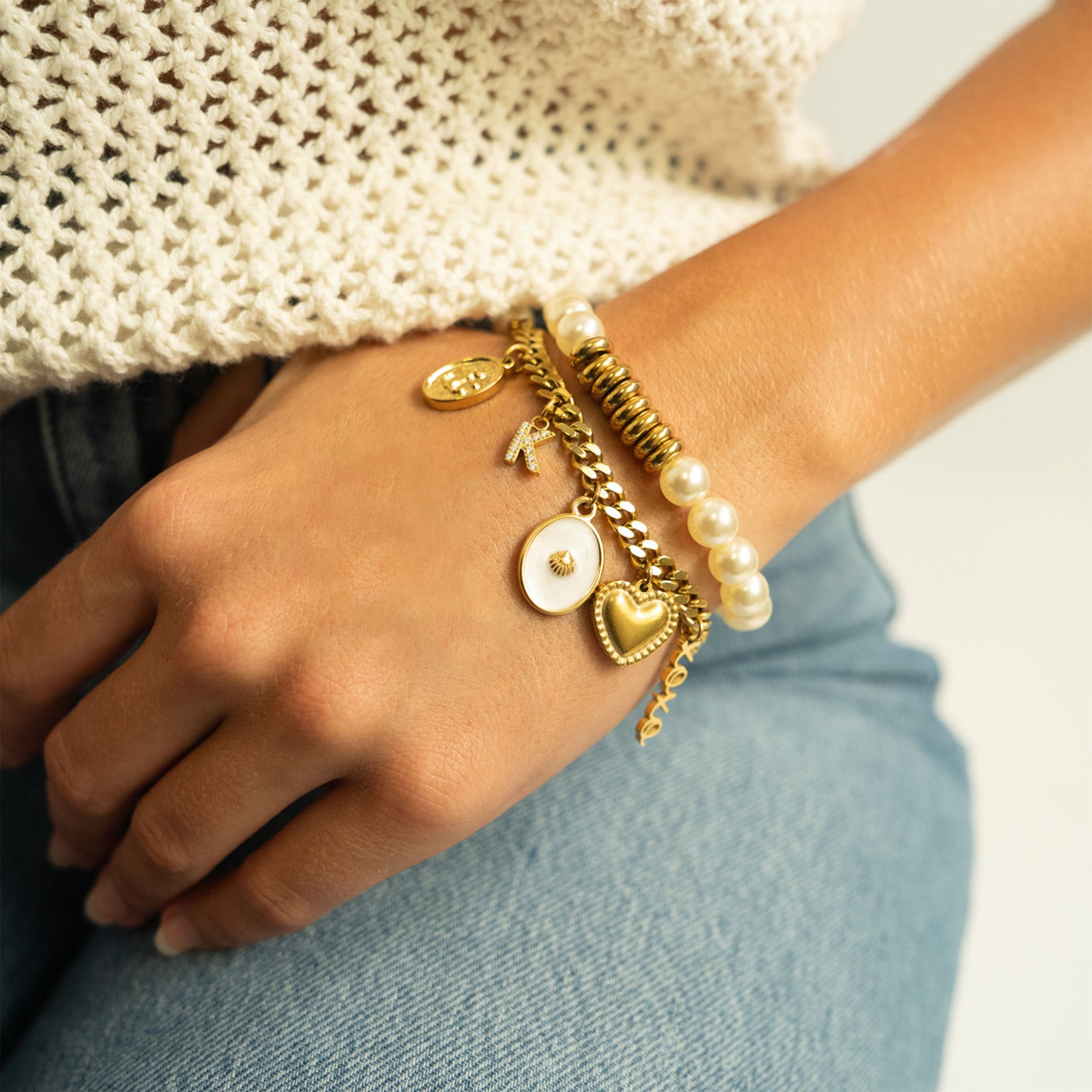 White Enamel Charm with Shell, On curb chain bracelet, with other charms, with stretch pearl bracelet