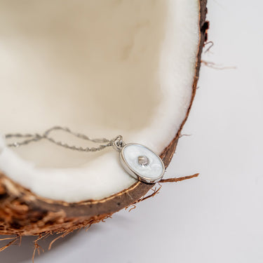 White Enamel Charm with Shell, on curb Singapore bracelet