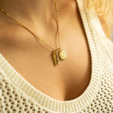 Blessed Charm w/other charms on Singapore Necklace